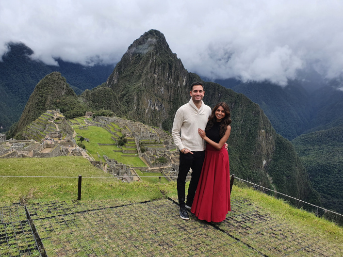 Couple in front of Machu Picchu citadel